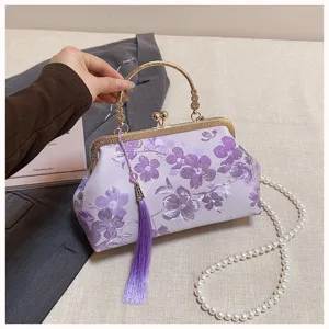 Exquisite chinesische bestickte Blumen Abendtasche mit Metallgriff und Quastenanhänger.