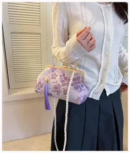 Chinesischer Stil Blumen Kussverschluss Abendtasche mit Perlenriemen und Troddel.