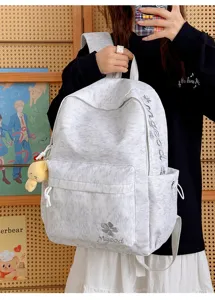 Casual nylon large capacity school backpack with embroidery letters for student girls daily use.