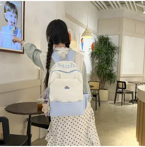 Stylish color block school backpack with large capacity, perfect for students and daily commuting.