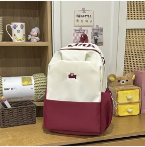 Colorblocked student backpack with letter embroidery large capacity book bag