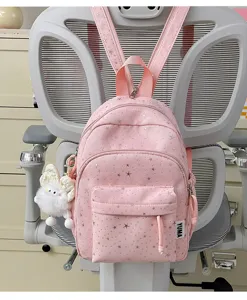 Roze sterrenprint schattige kleine rugzak voor dames student dagelijkse reis school tas detail