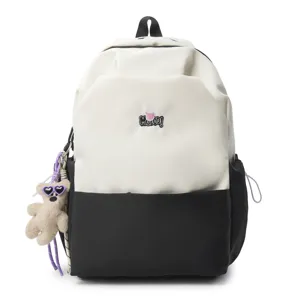 Classic color block school backpack with cute bear pendant, large capacity for students.