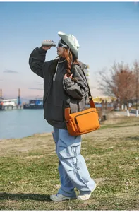 Bolso cruzado de trabajo naranja para hombres y mujeres, elegante bolso mensajero de exterior.