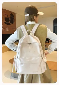 Japanischer minimalistischer Schleifen Rucksack für Schüler, niedliches Design mit Fächern.