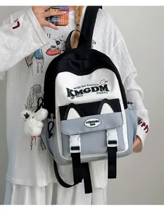 Detailed view of colorblocked school backpack with cute cat ears design and spacious compartment.
