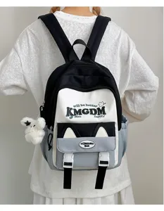 Casual color-block canvas backpack with cute cat ears design, large capacity school bag.