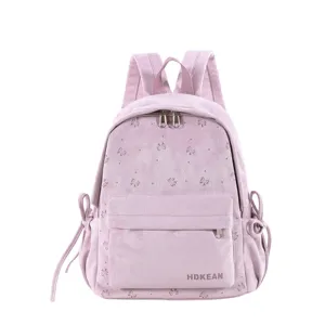 Hübscher rosa Schleifen Rucksack für Mädchen Schule Freizeit mit Vordertasche und Schulterriemen.