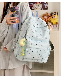 Nylon student backpack with cute star pattern, large capacity casual daypack for school.