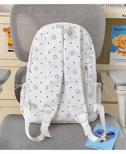 White nylon school backpack with cute star and dot print pattern detailed view for students.