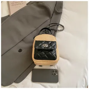 Mini straw backpack for women with black quilted PU front pocket, chic chain strap design.
