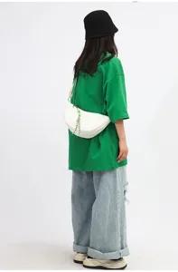 Nylon crescent crossbody bag for women, stylish solid color casual shoulder dumpling bag.