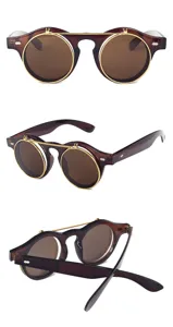 Vintage runde doppellagige Flip-Sonnenbrille mit goldenem Metallrahmen und braunen Gläsern.