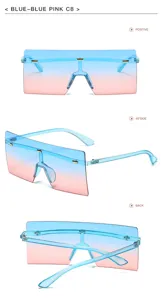 Occhiali da sole oversize sfumati monopezzo con decorazione di rivetti in metallo chic.