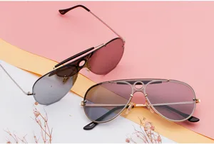 Fashion aviator sunglasses with gradient mirrored lenses and stylish hollow bridge design.