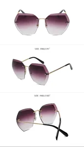 Vista detallada en primer plano de gafas de sol degradadas sin montura para mujer.