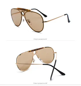 Stylish aviator sunglasses with unique hollow circle detail and brown gradient lenses