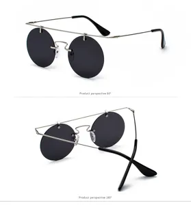 Lunettes de soleil rondes rétro avec monture fine en métal et design unique pour unisexe.
