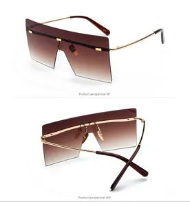 Gafas de sol de máscara oversize para mujer, lentes degradadas marrones sin montura de moda.