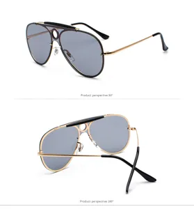 Detailed view of metal frame aviator sunglasses with hollow circular bridge design and grey lenses.