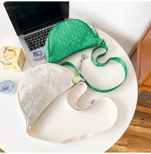 Nylon quilted dumpling shoulder bag, trendy half-moon crossbody bag with grid pattern.
