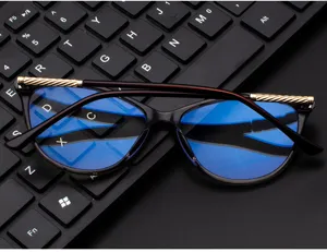 Close-up of stylish women cat-eye anti-blue light glasses with elegant gold spring temples.