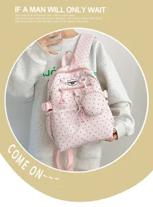 Joli sac à dos rose à pois pour fille, cartable décontracté mignon avec petite pochette.
