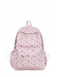 Pink nylon student backpack with cute floral dot pattern, large capacity school bag for girls daily use.