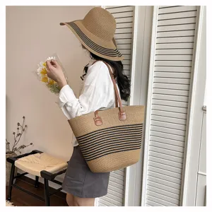 Stylish straw woven tote bag for women, large capacity shoulder bag for beach vacation.