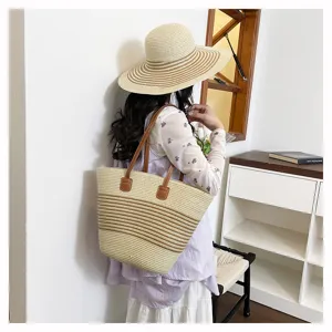 Stylish woven straw tote bag for women, large capacity shoulder bag for beach and daily commute.
