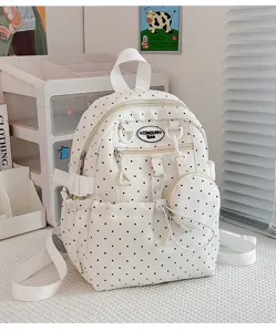 Joli sac à dos à pois avec petite pochette ronde sac d'école décontracté pour filles au quotidien.
