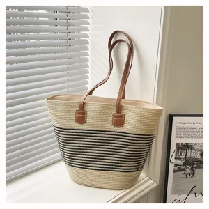 Woven straw tote bag for women, stylish striped beach shoulder bag with large capacity daily use.