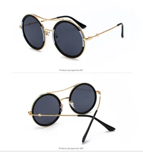 Gafas de sol redondas vintage con doble puente de metal y lentes negras estilo moderno.