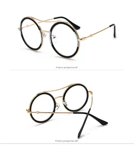Vista detallada de gafas vintage redondas de metal con un elegante y moderno doble puente.