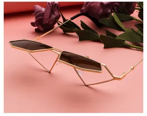 Unique geometric flip-up polygon sunglasses detail shot, retro fashion metal frame eyewear.