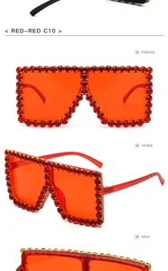 Occhiali da sole quadrati oversize con brillanti strass rossi e lenti rosse per uno stile unico.