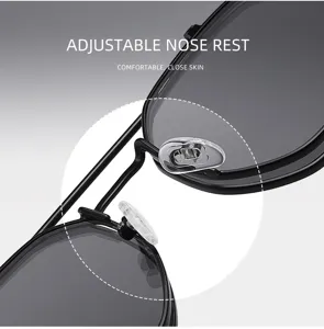Vue rapprochée des plaquettes nasales réglables et du pont en métal des lunettes steampunk.