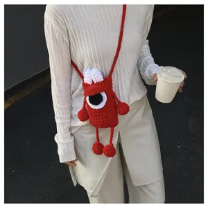 Cute handmade crochet red monster phone bag, stylish cross-body shoulder bag for women.