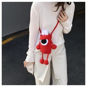 Cute handmade crochet red monster cross-body phone bag, stylish cartoon knit shoulder bag for women.