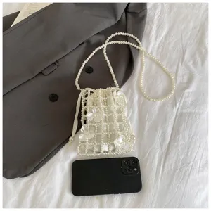 Handmade pearl beaded mini shoulder bag elegant hollow out crossbody phone bag for women