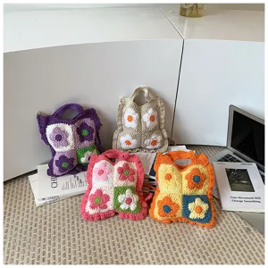 Borsa a mano floreale all'uncinetto fatta a mano, graziosa borsa in maglia colorblock per donne.