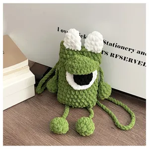 Handmade crochet single shoulder phone bag with cute big eye design, stylish crossbody pouch.