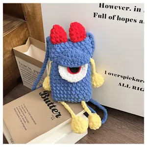 Cute handmade crochet monster phone bag detail, colorful cartoon crossbody bag for women.