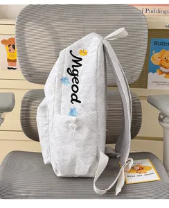 Casual nylon school backpack with letter embroidery, large capacity daily daypack for students.
