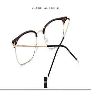 Vue détaillée de lunettes vintage semi-cerclées avec finition écaille et métal.