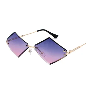 Stylish rimless diamond sunglasses with gradient purple lenses and gold metal frames for women.