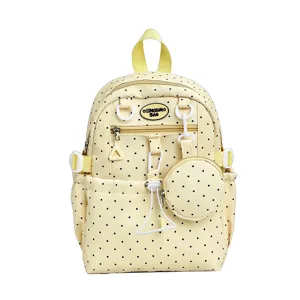 Détail de sac à dos étudiant à pois jaunes avec poche avant, cartable mignon.