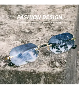 Detailed view of stylish polygonal rimless sunglasses with gradient lenses and gold accents.