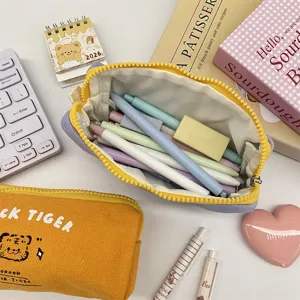 Cute canvas pencil case detail view, portable stationery storage bag with zipper and tiger print.