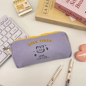 Cute purple canvas pencil case with yellow zipper, aesthetic student stationery pouch.